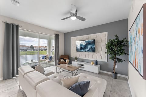 Modern open concept of living room, LAKE VIEW #Disney #Parks #kingdom #springs #StoreyLake #Apartment #Vacation #Rental #waterpark #Kissimmee #Orlando #universal #citywalk