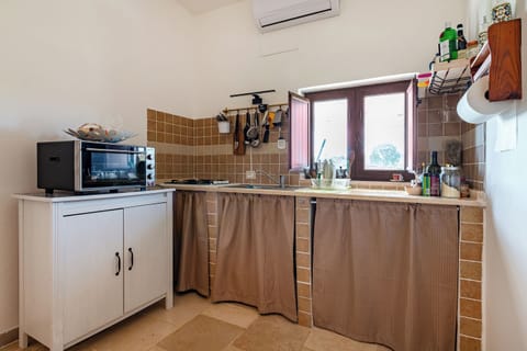 Family Villa, Multiple Bedrooms (Trullo ConoSolo With Pool) | Private kitchen | Fridge, oven, stovetop, coffee/tea maker