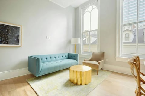 Bright and airy living room with a plush sofa.