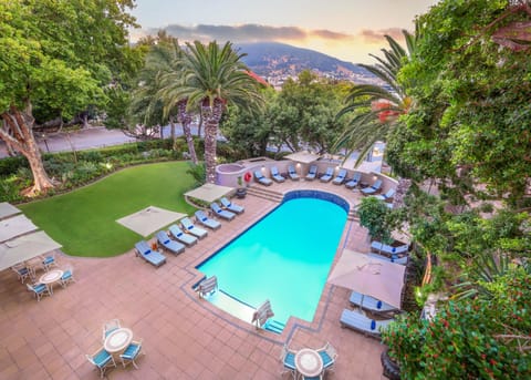 Outdoor pool, pool umbrellas, sun loungers