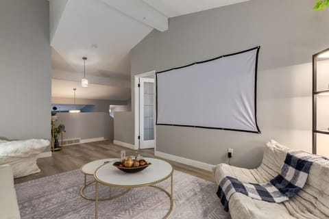 Living area with cozy seating and natural light
A modern, comfortable space designed for hosting and hanging out. Projector is perfect for movie nights.