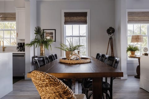 Spacious dining table perfect for family meals and group gatherings.