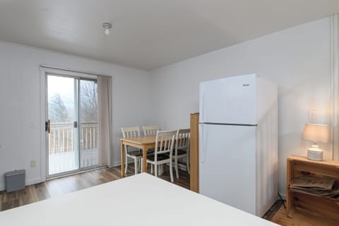 Your bright, airy space combines comfort and convenience, with a cozy dining area perfect for meals and peaceful views from your private balcony.