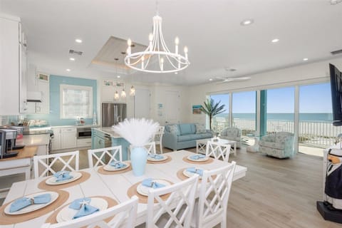 Living and Dining area with ocean views. Dining seating provided for up to 10