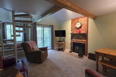 Bright and airy space with a spiral staircase, perfect for relaxing after adventure!