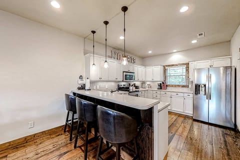 Stylish space with modern appliances and island seating for culinary adventures!