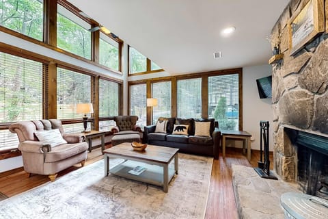 Living room retreat awaits. A bright spaces with plush seating invite relaxation and nature's embrace!