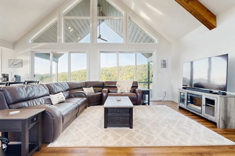 Enjoy breathtaking views and modern comforts in this spacious gathering area!