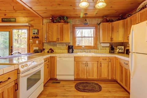 Kitchen paradise awaits. And, enjoy cooking in this spacious wood-accented kitchen with nature views!