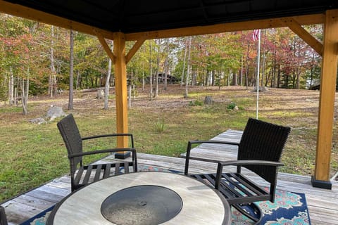 Unwind in style under the canopy, surrounded by vibrant fall foliage!