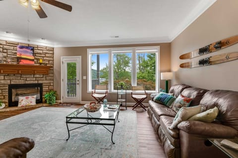 Living room oasis awaits. Complete with a stunning views and stylish decor await you in this bright, inviting space!