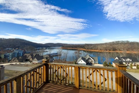 Breathtaking lake views and hillside charm await from your private balcony!