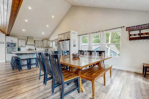 Gather around the spacious table, perfect for feasts and laughter!