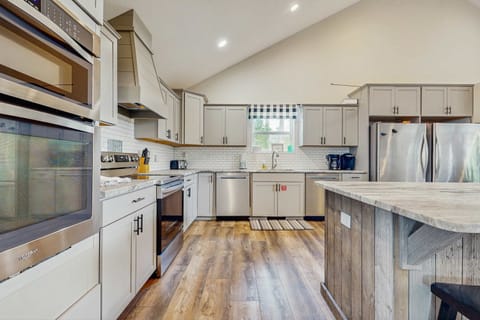 Kitchen oasis awaits. Complete with modern amenities and bright spaces await your culinary adventures!