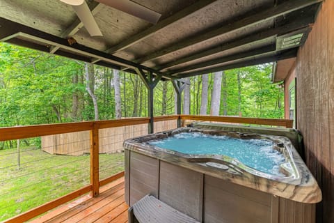 Hot tub retreat awaits. And, soak in luxury while surrounded by nature's vibrant greens!