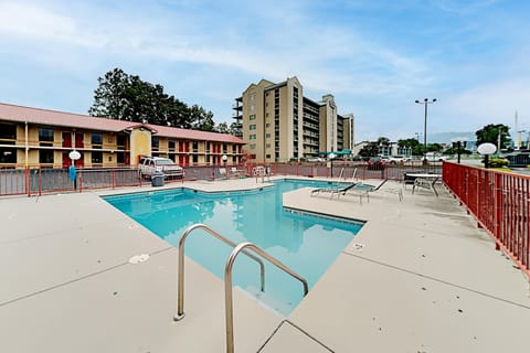 Poolside retreat awaits. And, dive into relaxation with a sparkling pool and vibrant surrounding views!