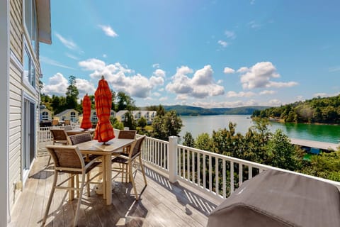 Spacious upper deck with outdoor dining, grill, and sweeping lake views. Perfect for al fresco meals, sunsets, and relaxing lakefront evenings.