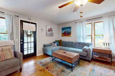 Bright and airy space with plush seating and rustic charm, perfect for relaxation!