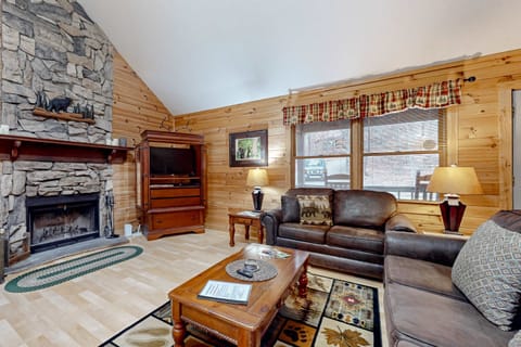 Gather around the stone fireplace for heartwarming chats and cherished memories!