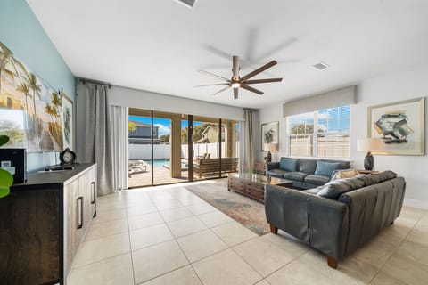 Bright Modern Living Room with Poolside Views