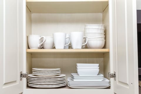 Cups, mugs, plates and bowls are included