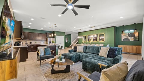 Bright & Spacious Living Room – A cozy open-concept lounge with plush seating, perfect for movie nights and family time.