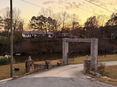 Gated long driveway that leads to the house,with views of the lake. 13.6x15ft