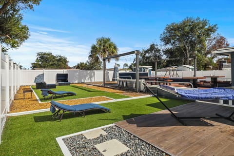 Tropical backyard with plenty of activities