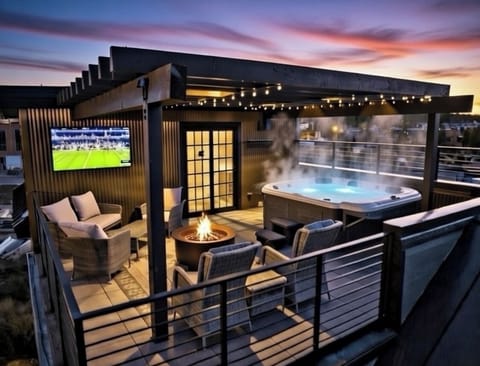 Catch the game by the fire or soak in the private hot tub after all the action!