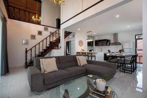 Exclusive Villa | Living area | Flat-screen TV