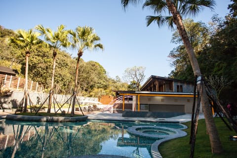 Outdoor pool, pool umbrellas, sun loungers