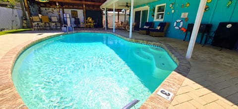 Enjoy your own private heated pool, surrounded by a spacious outdoor living area