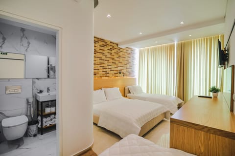 Superior Quadruple Room, Sea View | Desk, free WiFi