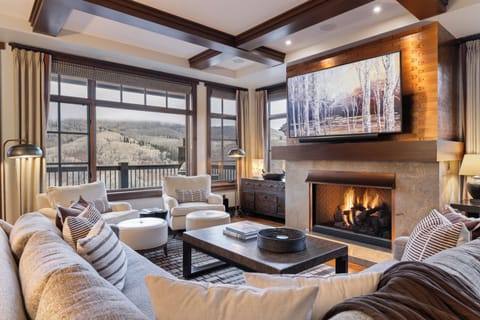 Living room with gas fireplace, Samsung Art TV, Sonos sound system, great views