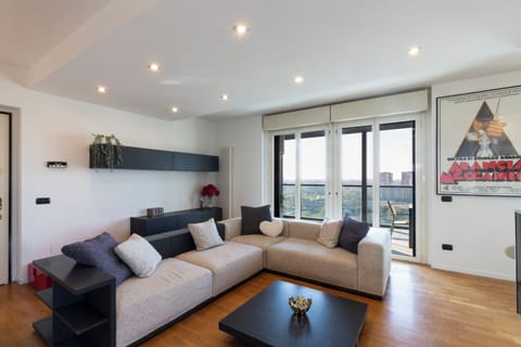 Comfort Double Room, City View | Living area | 65-inch Smart TV with digital channels