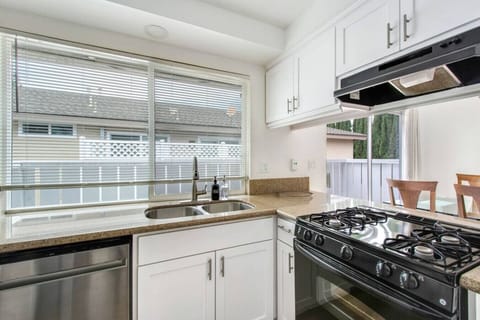 Fully equipped kitchen with gas stove and ample counter space