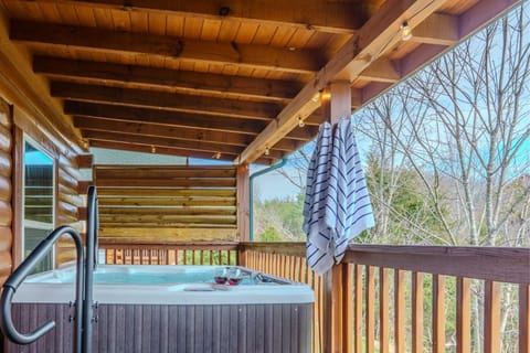Hot Tub Retreat. Savor unwinding in style with scenic views and intimate lighting!