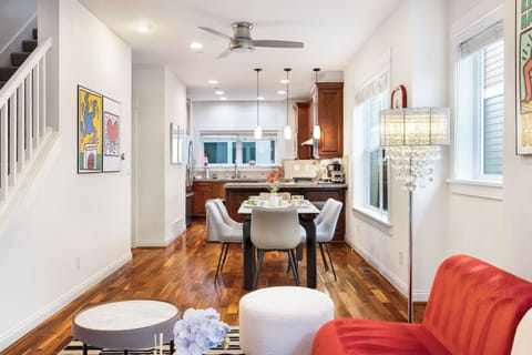 Stylish flow from living room to kitchen—perfect for entertaining.