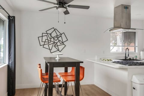 Modern kitchen and dining area.