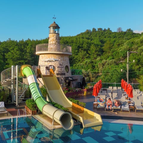 Indoor pool, 2 outdoor pools, open 7:00 AM to 7:00 PM, pool umbrellas