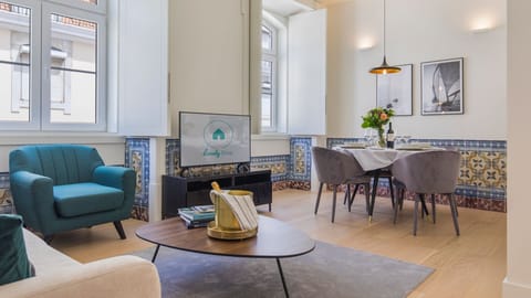 Airy and sophisticated, this open-plan space blends modern comfort with timeless design — ideal for both relaxing and entertaining.

#AndoLiving #LisbonStyle #InteriorVibes #TileDetails