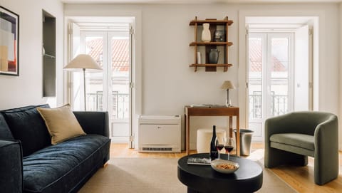 Sophisticated yet welcoming, this living area captures the essence of refined Lisbon living—bold art, plush seating, and modern serenity.

#TimelessInteriors #LisbonEscape #CuratedSpaces #Portugal #AndoLiving