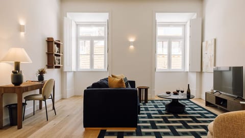 Natural light floods this serene living room, blending comfort with sophisticated design.
 #AndoLiving #Portugal #Santos #LisbonLiving #InteriorGoals
