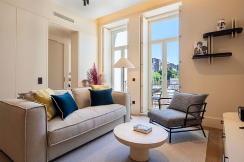 A comfortable living room filled with natural light.

#livingroom #naturallight #porto