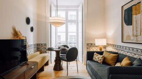 An amazing combination of modern furniture with old original tiles that compose the living room. #design #decor #lisbon #pt #portugal