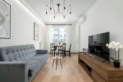 Bright living room with a spacious layout and elegant décor.