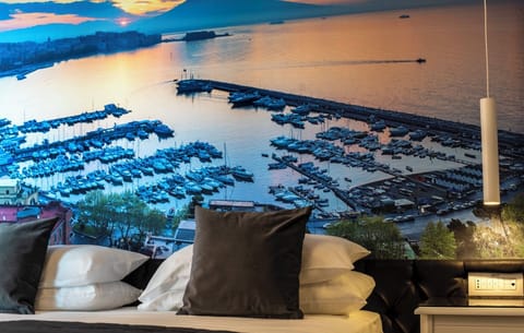 Deluxe Double Room, Partial Sea View | Minibar, in-room safe, free WiFi, bed sheets