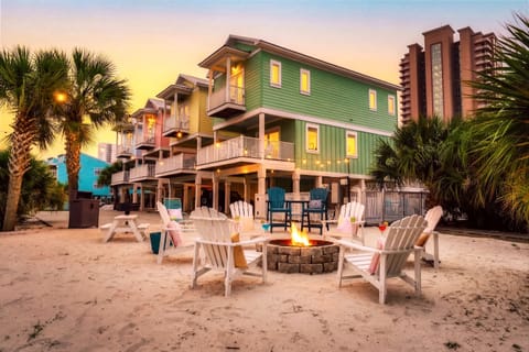 Settle into our sandy relaxation zone featuring casual seating and gentle coastal breezes