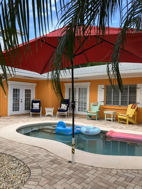 "Shade meets shimmer; the PERFECT POOL MOMENT.  shaded pool seating 