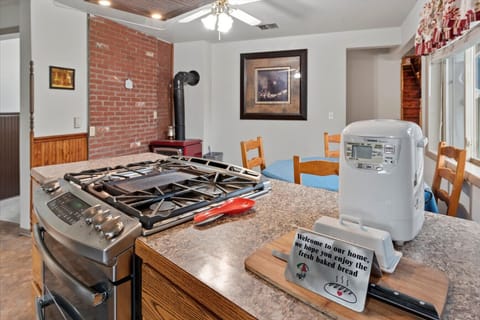You will love preparing meals at this gas stove as well as the complimentary fresh baked bread.